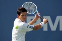 tim henman backhand slice before contact.jpg