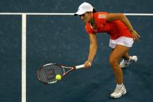 justine henin forehand volley low ball.jpg