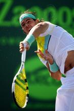 Rafael Nadal serve as beads of sweat fly.jpg