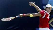 eleni daniilidou backhand slice follow through.jpg