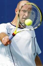 ivan ljubicic backhand slice at contact.jpg