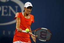 justine henin backhand near contact.jpg