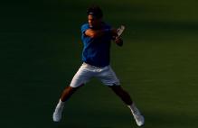 roger federer backhand follow through 2.jpg
