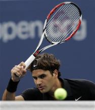 roger federer backhand follow through.jpg