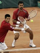 novak djokovic backhand volley near contact 2.jpg