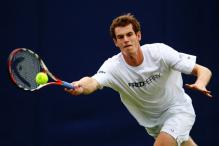 Andy Murray reaches for a defensive forehand shot.jpg