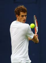 Andy Murray winds up for his two handed backhand.jpg