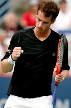 Andy Murry celebrates a point in a black shirt.JPG