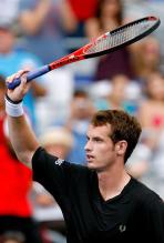 Andy Murry raises his racket to the crowd.JPG