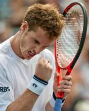 Andy Murray celebrates while holding his Head Youtek racquet.JPG