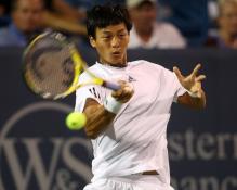 Yen-Hsun Lu hits a sweeping forehand.JPG
