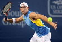Robby Ginepri reverse forehand follow through.JPG