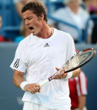 Marat Safin yells during after a point.JPG
