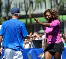 John McEnroe gets gives from Serena Williams.JPG
