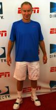 John McEnroe in blue shirt at the direct TV ESPN US OPEN Experience 2009.JPG