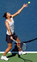 Safina tosses the ball on her serve.JPG