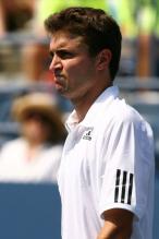 Gilles Simon looks on.JPG