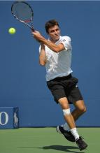 Gilles Simon has an interesting grip on his two handed backhand.JPG