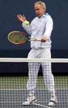 John McEnroe hits a ball at the US Open 2009.JPG