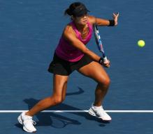 Li Na hits a forehand volley.JPG