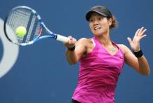 Li Na drives a forehand with her Babolot racket.JPG