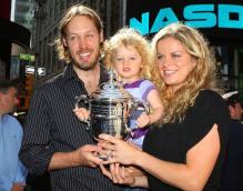 Kim Clijsters with her daughter and husband at Times Square New York.JPG