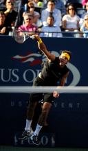 Del Potro jump serve follow through.JPG