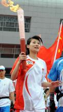 Li Na carries the Olympic torch.JPG