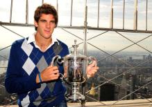 Juan Martin Del Potro holds his US Open trophy atop of the Empire State Building in Manhattan.JPG