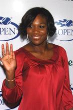 Serena Williams with short hair in red dress.jpg