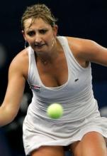 Timea Bacsinszky hits a slice forehand.JPG