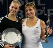 Timea Bacsinszky takes a photo with Sabine Lisicki.JPG