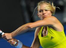 Maria Kirilenko hits a 2 handed backhand at the 2010 Australian Open.JPG