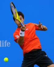 Yen-Hsun Lu hits a topspin forehand at the AEGON championships 2010.JPG