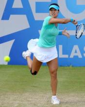 Li Na full torso twist on an inside-out forehand.JPG