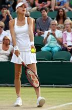 Anna Kournikova gets ready to toss the ball on her serve.JPG