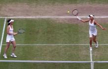 Anna Kournikova forehand volley during Wimbledon 2010.JPG