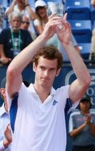 Andy Murray holds up the runner-up trophy at UCLA 2010.JPG