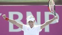 Ashley Harkleroad celebrates her Fed Cup win.jpg