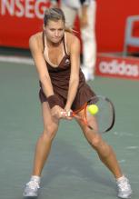 Maria Kirilenko hits a two-handed backhand.jpg