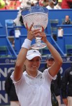 Maria Kirilenko holds up her trophy.jpg