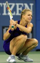Maria Kirilenko squats after hitting a 2 handed backhand.JPG