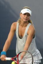 Maria Kirilenko prepares to serve.jpg