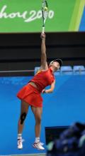 Peng Shuai leaps in the air to hit a serve in Guangzhou 2010.JPG