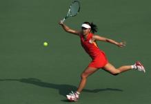 Peng Shuai chases down a forehand in Guangzhou 2010.JPG