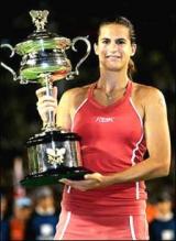 Amelie Mauresmo holds up the 2006 Australian Open Championship trophy.jpg