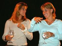 Amelie Mauresmo listens to Svetlana Kuznetsova.jpg