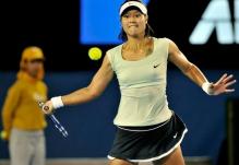 Li Na eyes the ball as she prepares to hit a forehand at the 2011 Australian Open finals.JPG