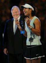 Li Na has a laugh as she talks on the microphone after the Australian Open 2011 championship match.JPG