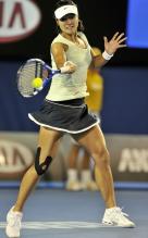 Li Na hits a forehand during the 2011 Australian Open championship finals.JPG